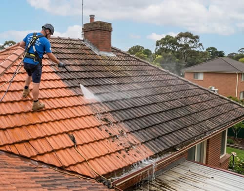 Richards roof contractor services pressure washing getting it ready to stain the roof